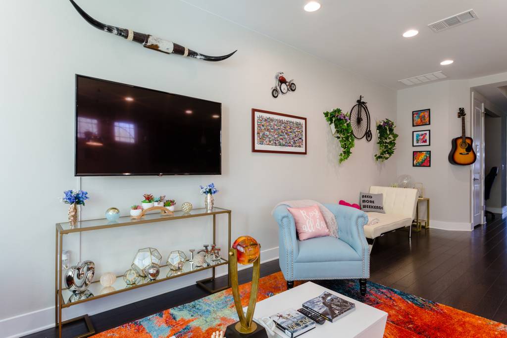 807 East 16th Street, Unit A Austin, TX 78702 - Photo 5 of 29 a living room with furniture and a flat screen tv