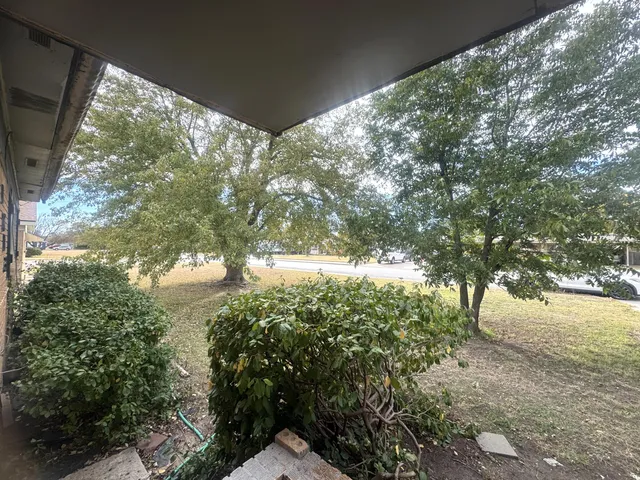 a view of yard from balcony