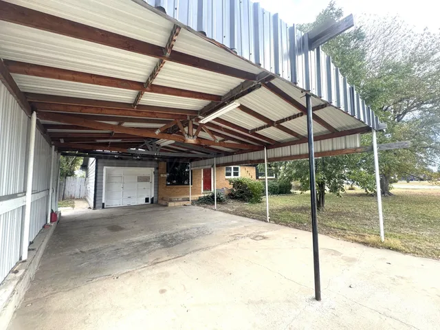 a car parked in front of garage