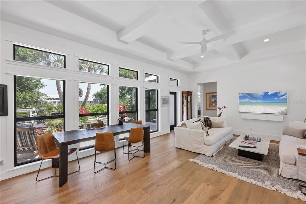 4624 Pompano Street Placida, FL 33946 - Photo 13 of 39 a living room with furniture and a large window
