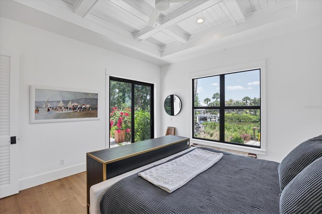 4624 Pompano Street Placida, FL 33946 - Photo 16 of 39 a living room with furniture and a large window