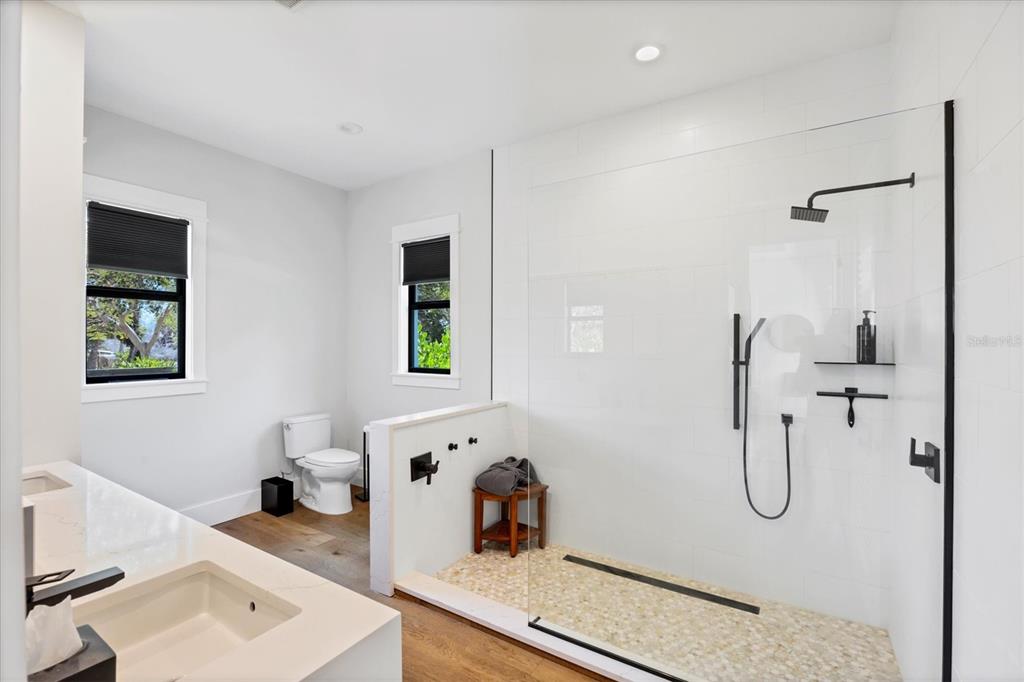 4624 Pompano Street Placida, FL 33946 - Photo 18 of 39 a bathroom with a tub sink and mirror