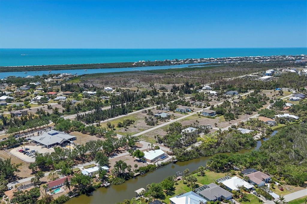 4624 Pompano Street Placida, FL 33946 - Photo 36 of 39 an aerial view of residential building and ocean