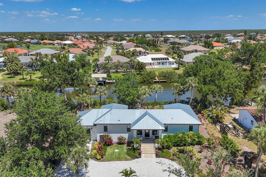 4624 Pompano Street Placida, FL 33946 - Photo 37 of 39 an aerial view of a house with a garden