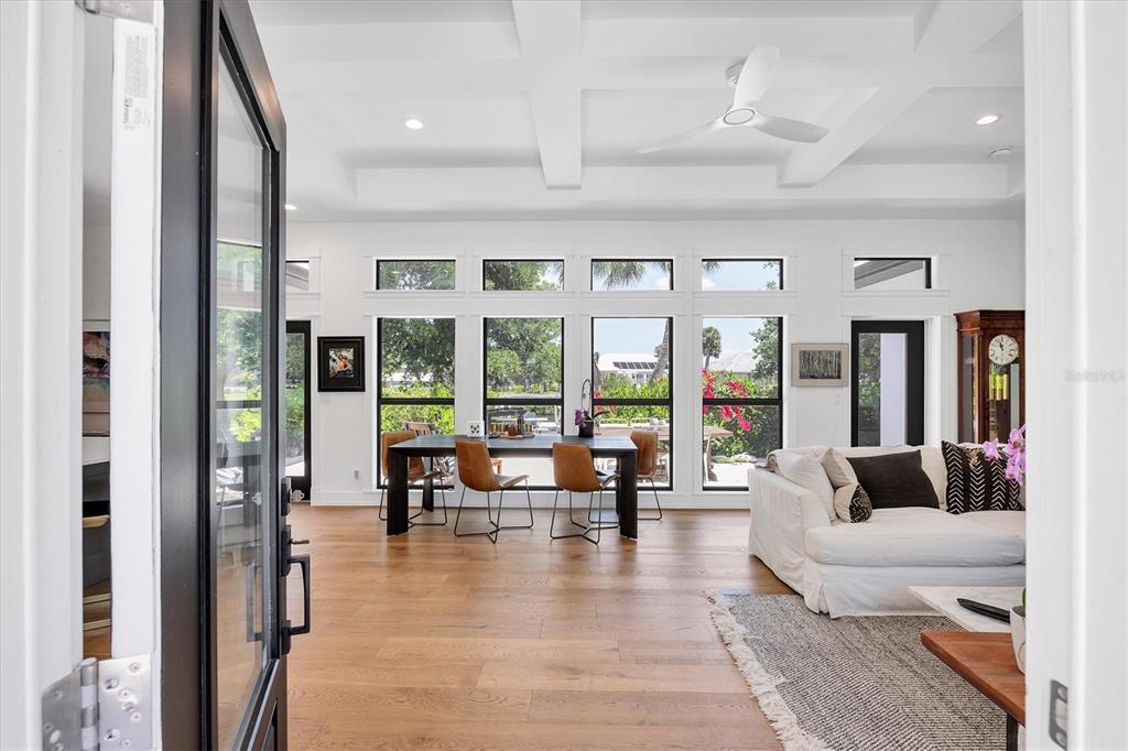 4624 Pompano Street Placida, FL 33946 - Photo 4 of 39 a living room with furniture and large windows