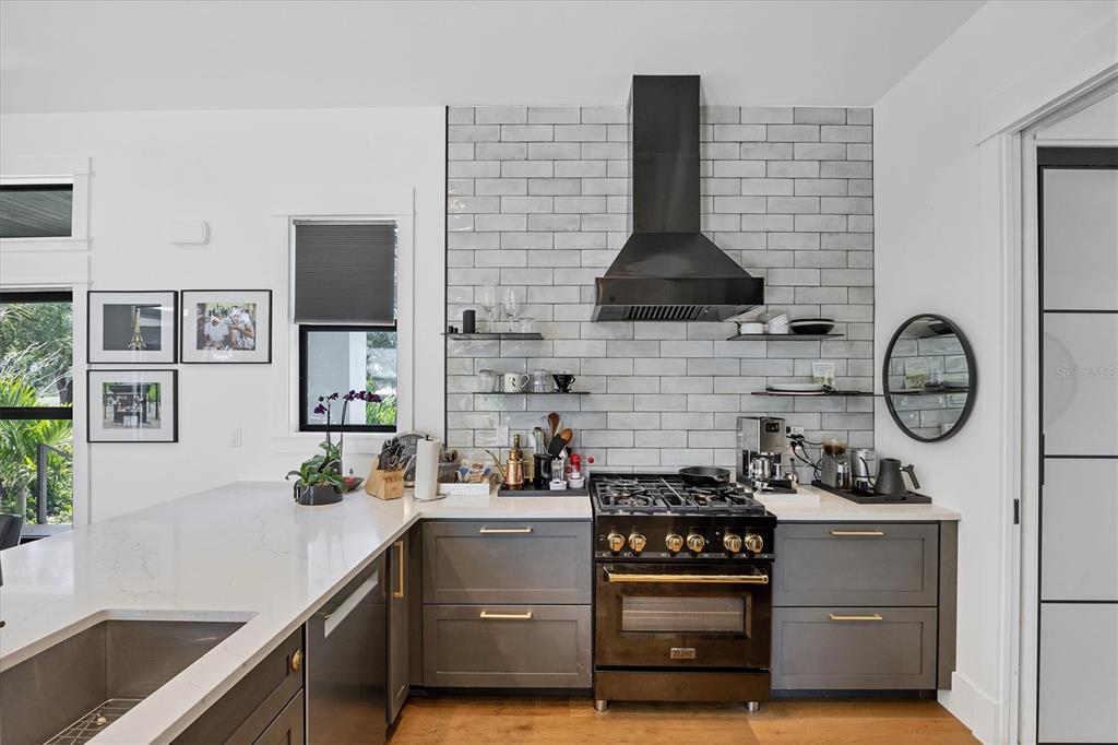 4624 Pompano Street Placida, FL 33946 - Photo 7 of 39 a kitchen with a stove and a sink