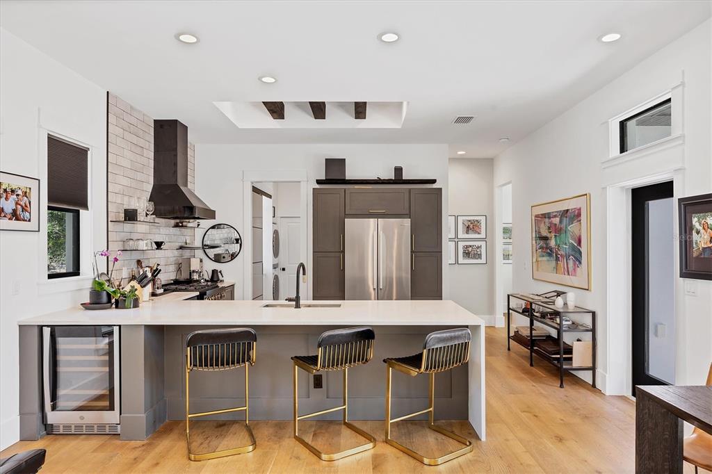 4624 Pompano Street Placida, FL 33946 - Photo 10 of 39 a kitchen with stainless steel appliances kitchen island granite countertop a sink and cabinets