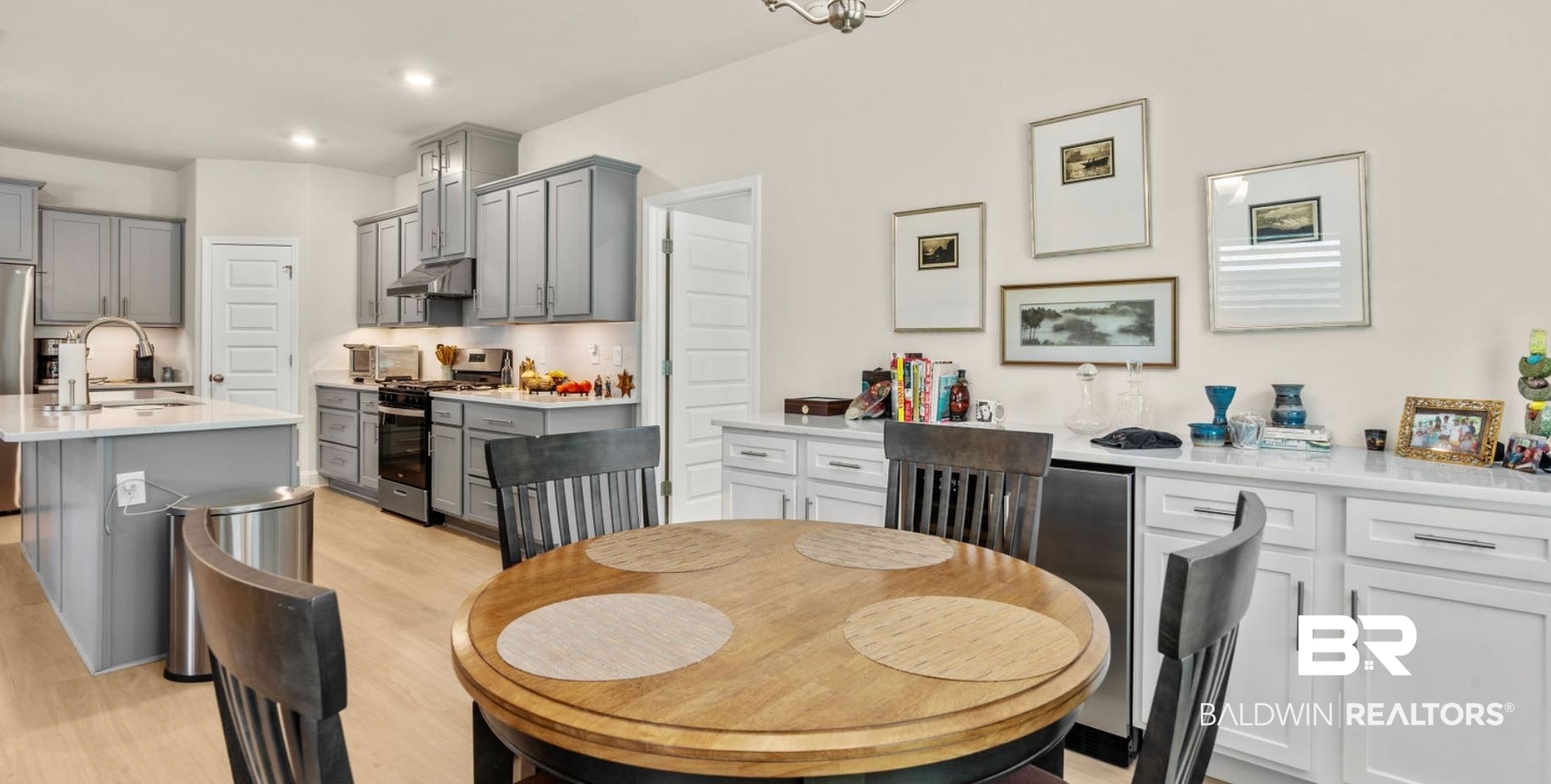 8841 Calverton Street Foley, AL 36535 - Photo 26 of 51 Dining area featuring sink and light hardwood / wood-style floors