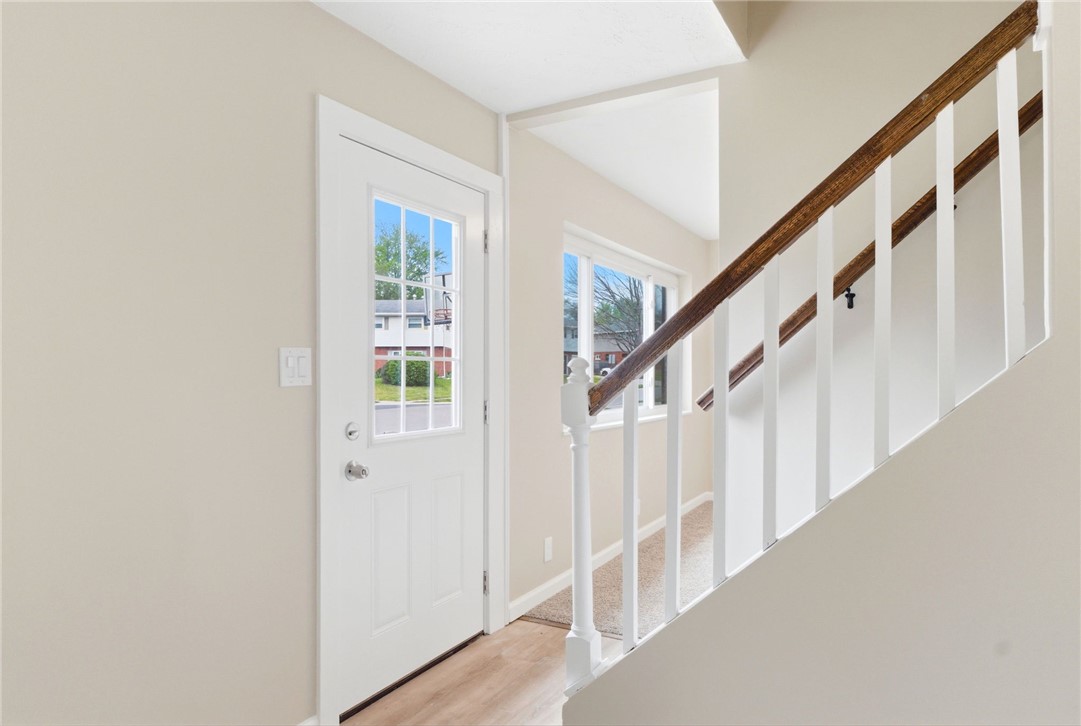 40 Woods Road Springboro, OH 45066 - Photo 20 of 57 This entry welcomes you with bright light and a charming staircase.