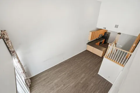 wooden floor with staircase