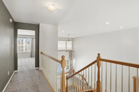 a view of hallway with stairs