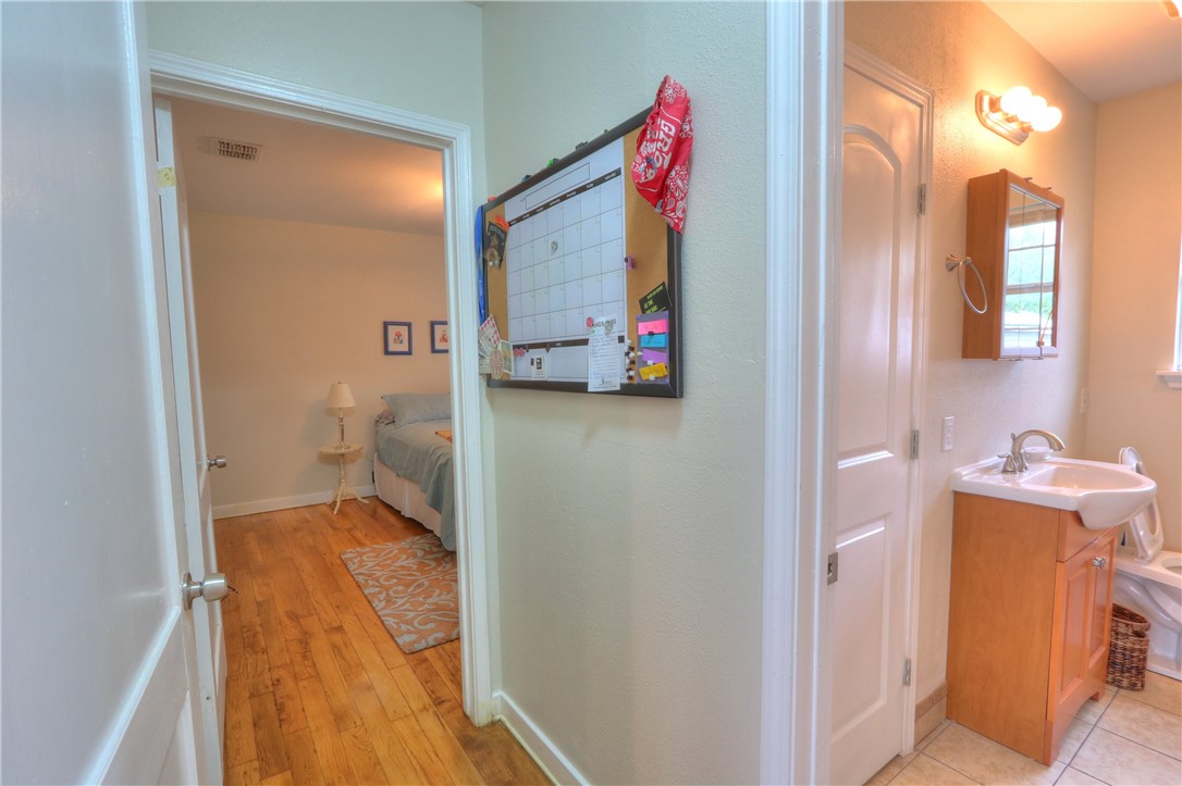 3538 Austin Street Corpus Christi, TX 78411 - Photo 18 of 21 a bathroom with a sink and a mirror