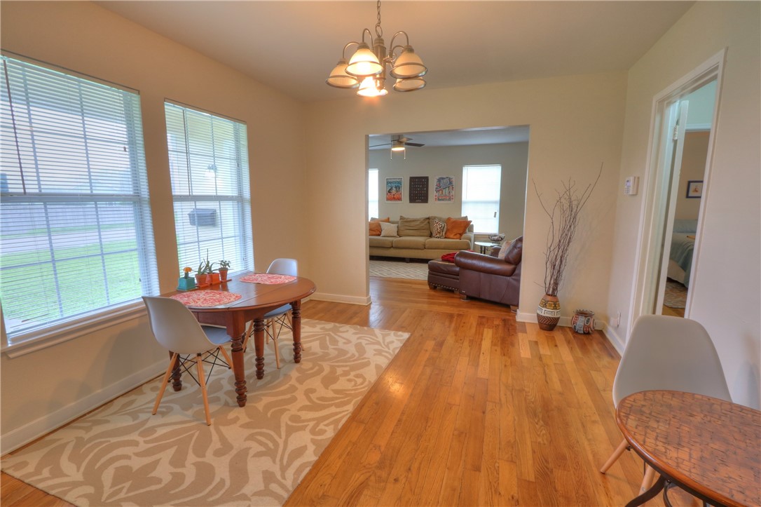 3538 Austin Street Corpus Christi, TX 78411 - Photo 9 of 21 a view of a dining room with furniture window and wooden floor