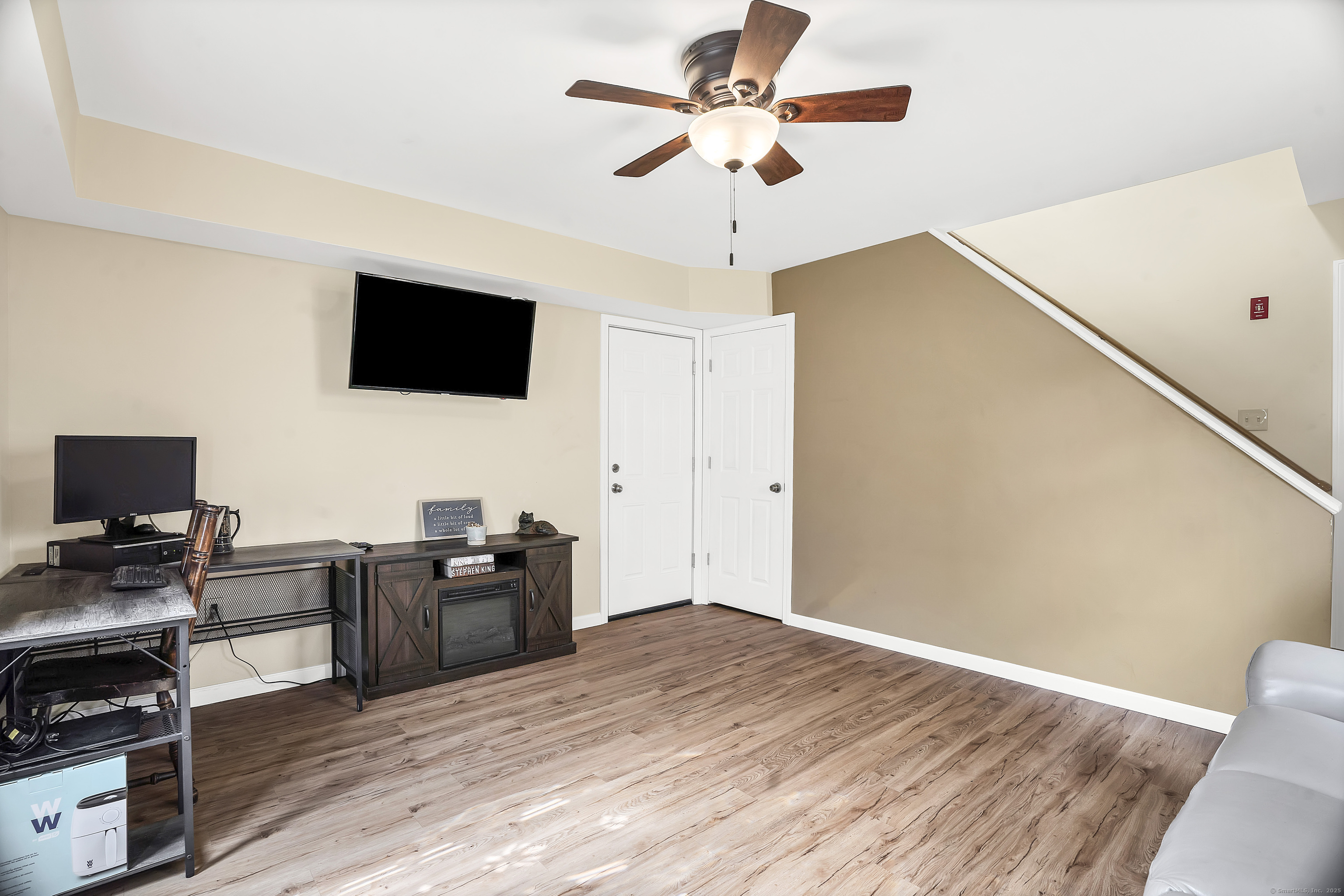 132 Howard Avenue Ansonia, CT 06401 - Photo 4 of 16 a living room with furniture and a flat screen tv