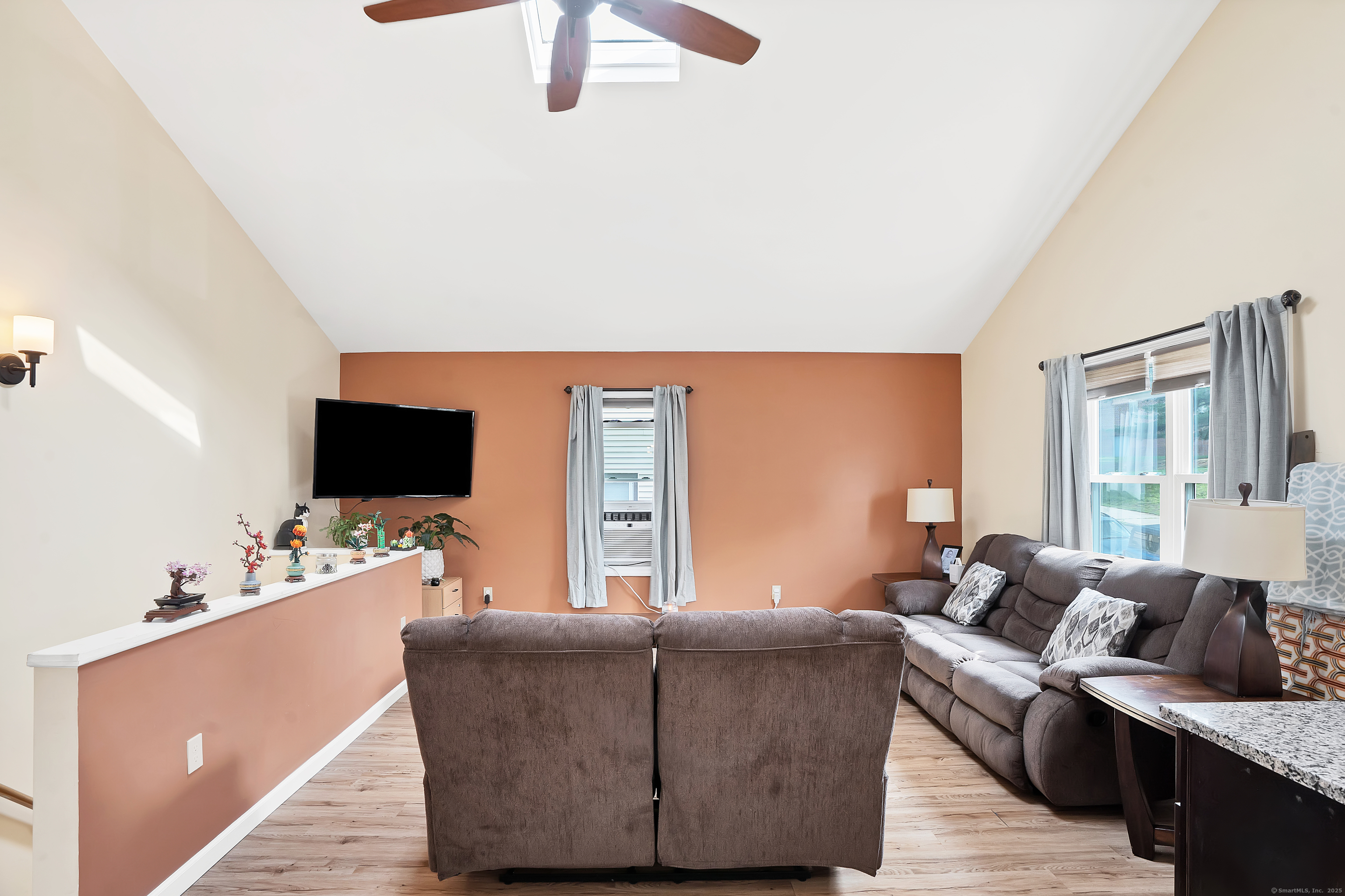 132 Howard Avenue Ansonia, CT 06401 - Photo 7 of 16 a living room with furniture and a flat screen tv