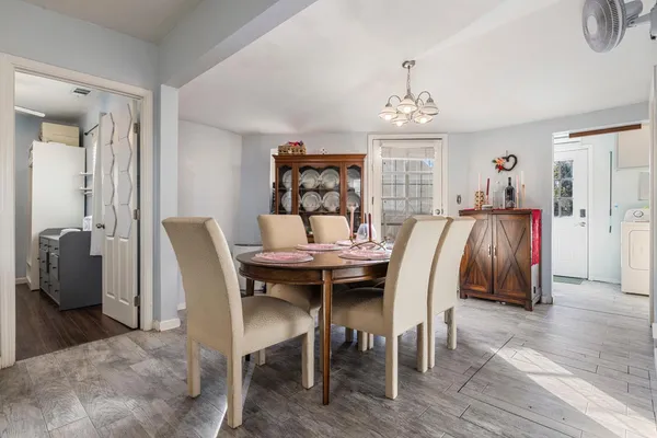 a view of a dining room with furniture