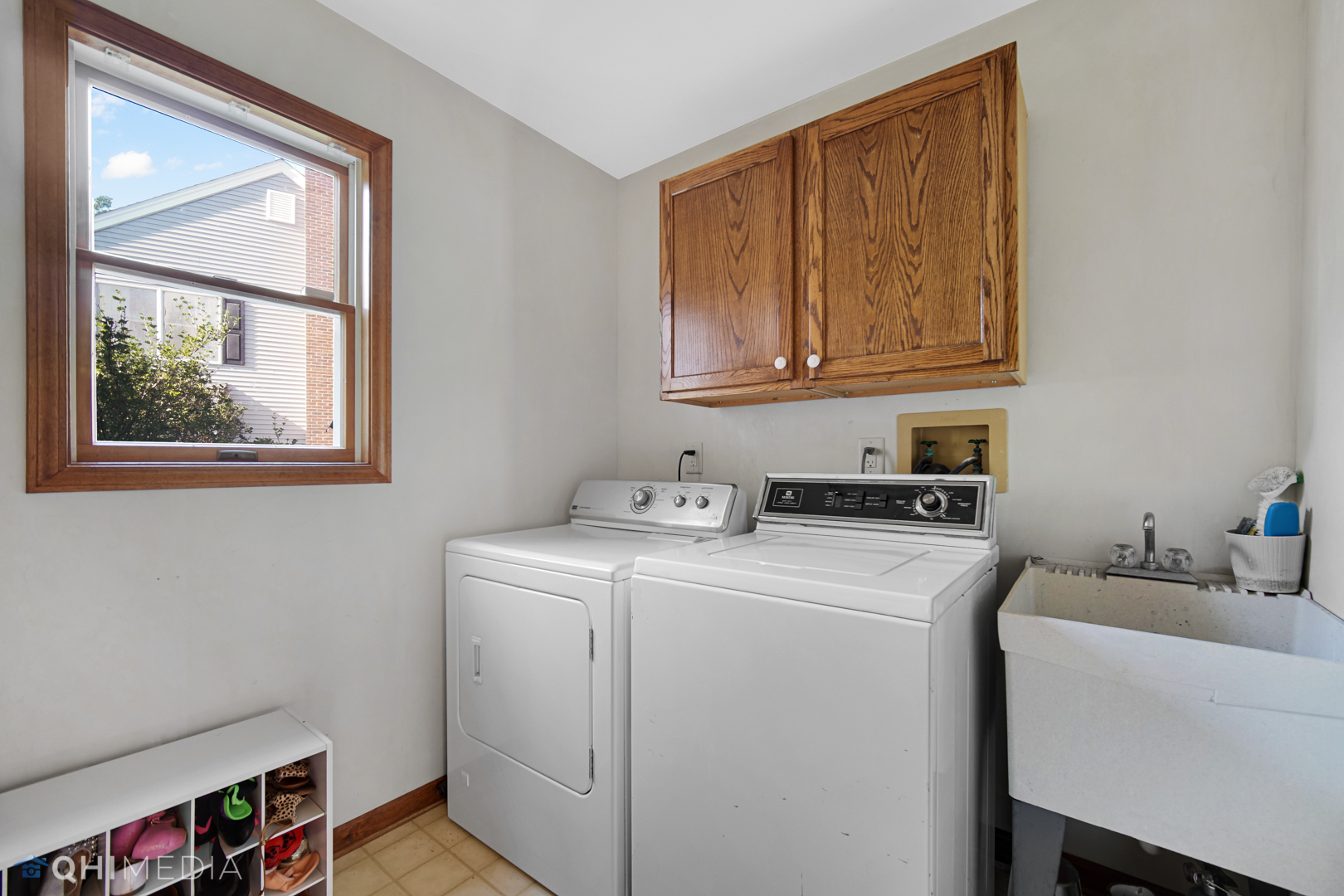 2125 Forest Ridge Road St. Charles, IL 60174 - Photo 25 of 28 a view of storage and utility room with washer and dryer