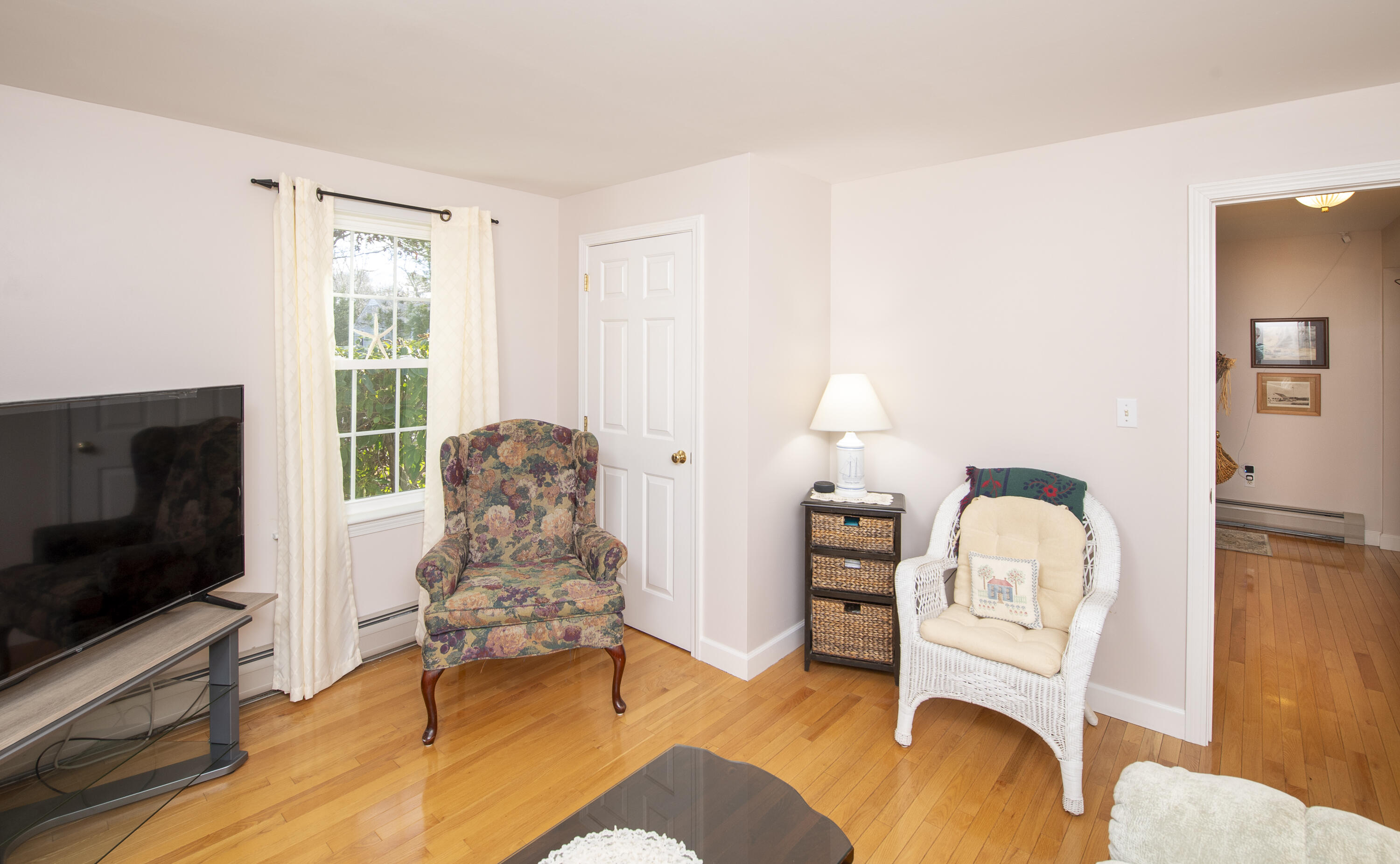31 Mashpee Neck Road Mashpee, MA 02649 - Photo 18 of 65 a living room with furniture fireplace and flat screen tv