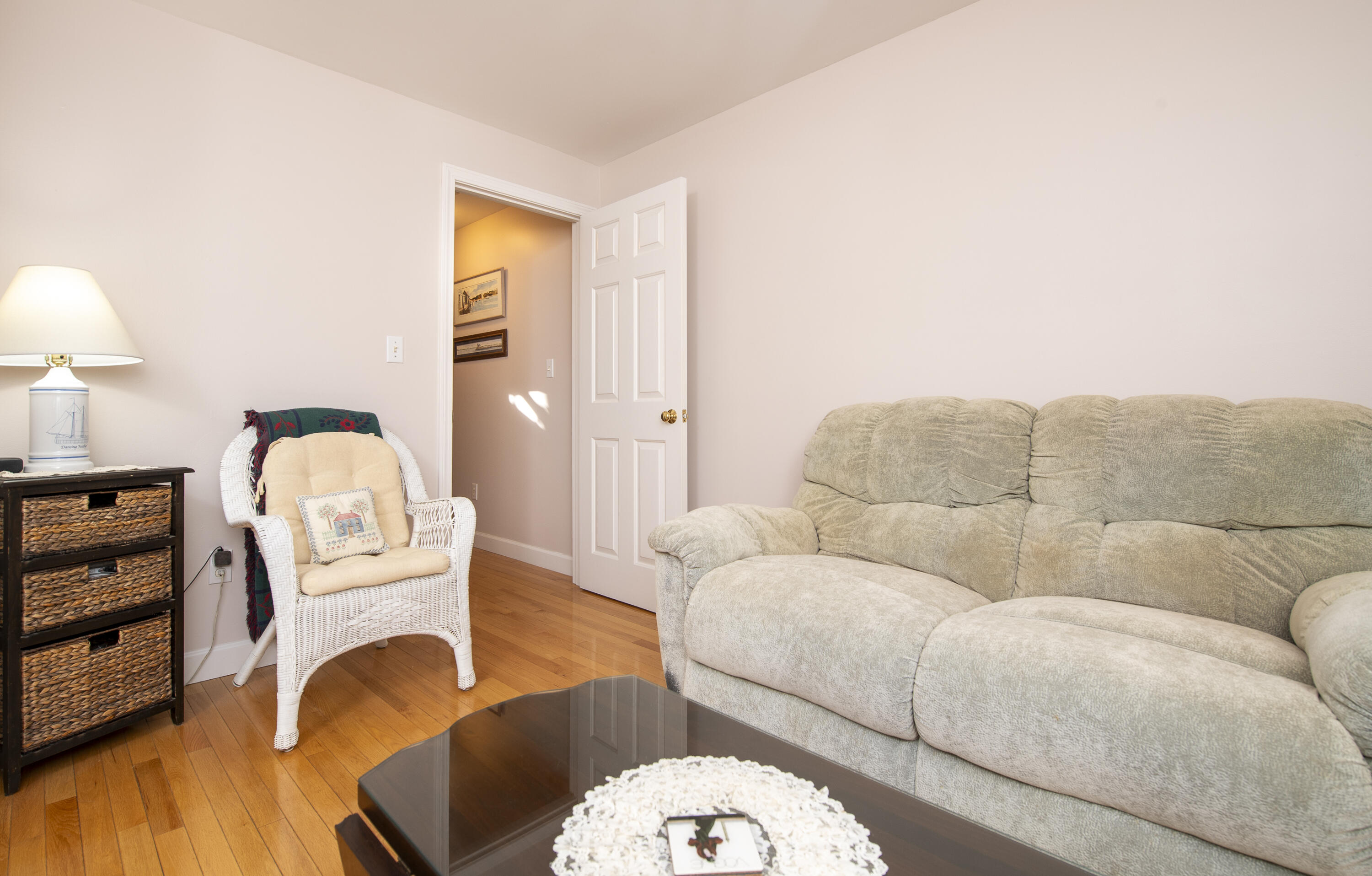 31 Mashpee Neck Road Mashpee, MA 02649 - Photo 19 of 65 a living room with furniture a couch and wooden floor