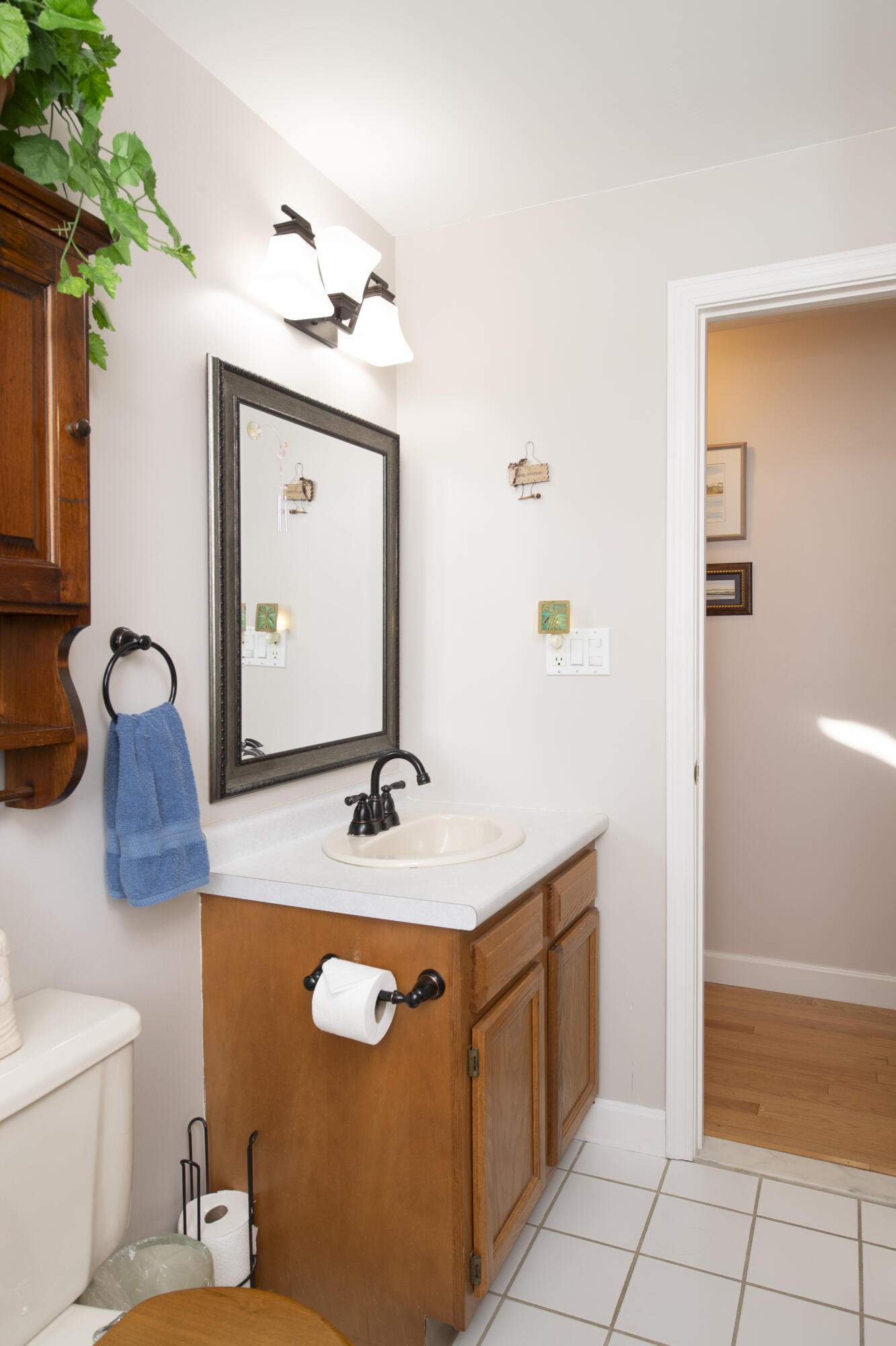 31 Mashpee Neck Road Mashpee, MA 02649 - Photo 22 of 65 a bathroom with a granite countertop sink and a mirror