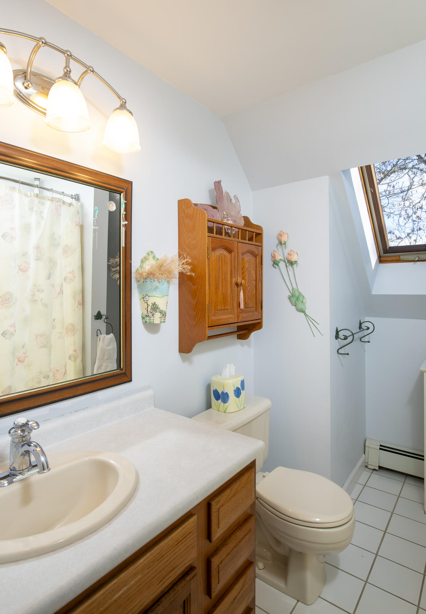 31 Mashpee Neck Road Mashpee, MA 02649 - Photo 30 of 65 a bathroom with a granite countertop sink mirror vanity and toilet