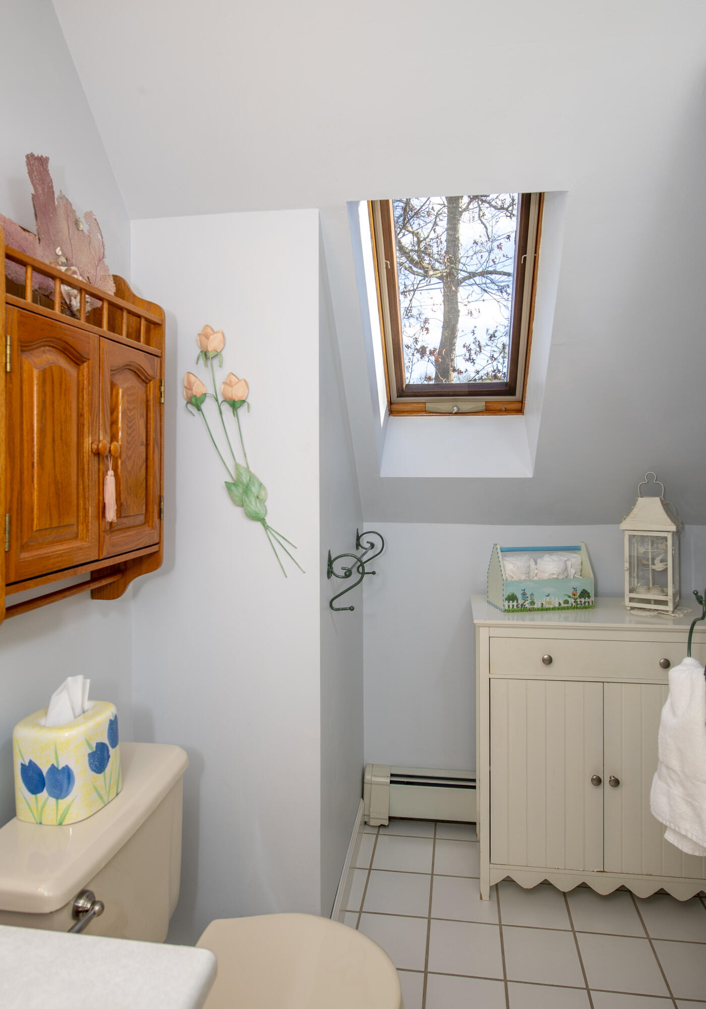 31 Mashpee Neck Road Mashpee, MA 02649 - Photo 31 of 65 a bathroom with a sink a toilet and a window