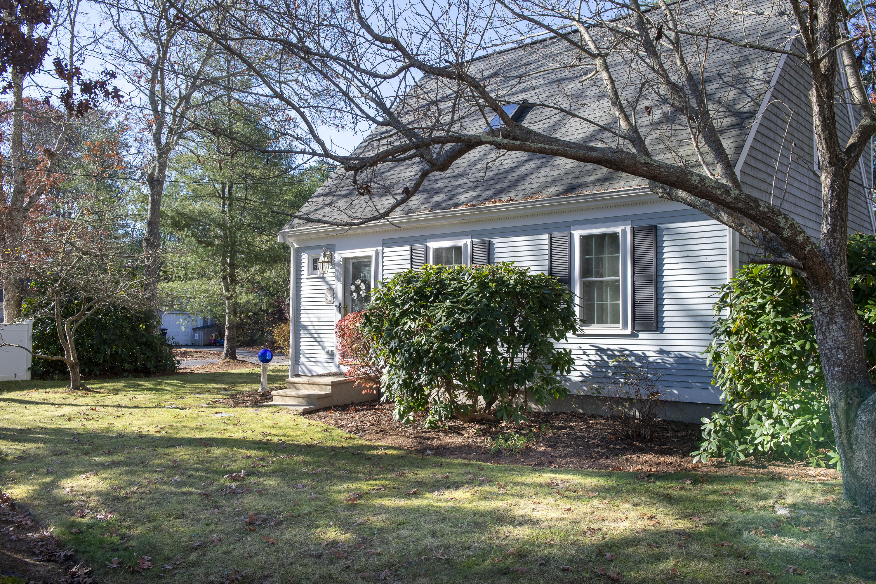 31 Mashpee Neck Road Mashpee, MA 02649 - Photo 42 of 65 a view of a house with a yard