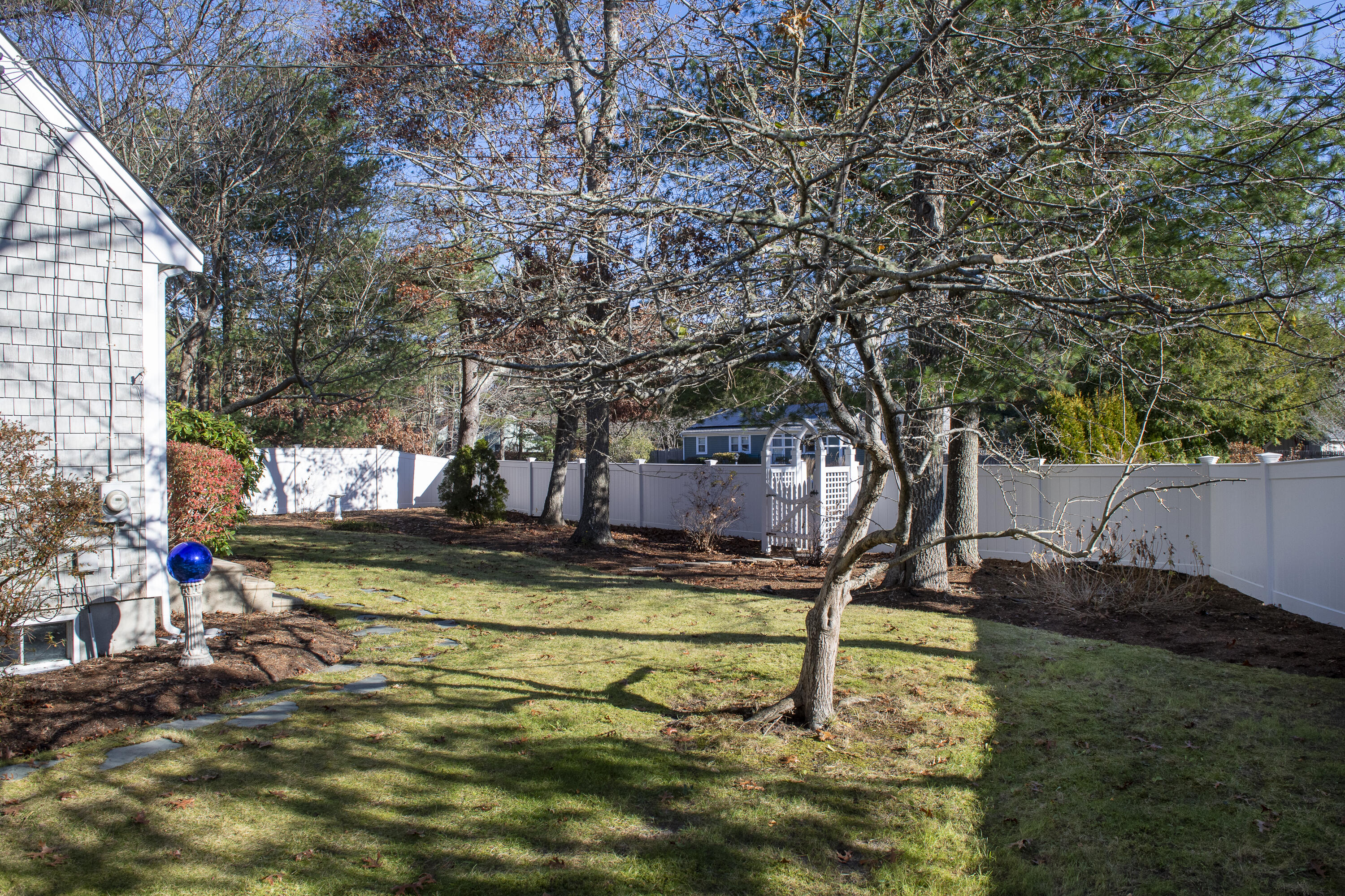 31 Mashpee Neck Road Mashpee, MA 02649 - Photo 43 of 65 a view of a swimming pool with a patio