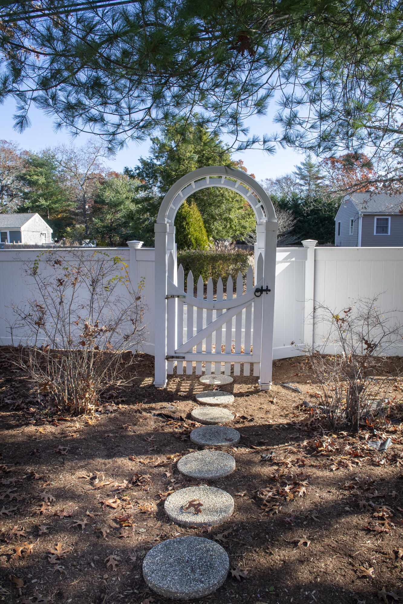 31 Mashpee Neck Road Mashpee, MA 02649 - Photo 46 of 65 a backyard of a house with lots of green space