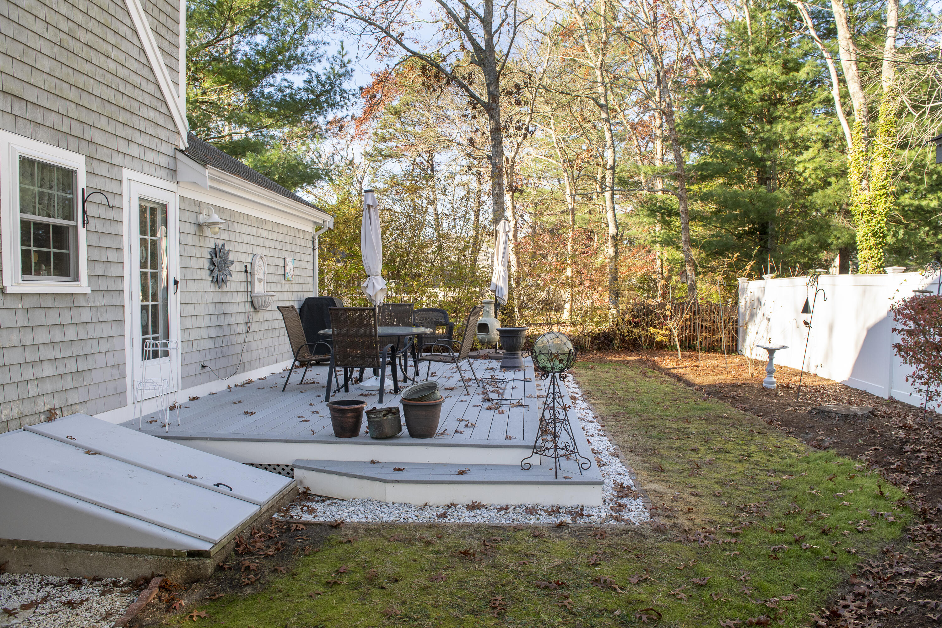 31 Mashpee Neck Road Mashpee, MA 02649 - Photo 50 of 65 a view of a house with backyard