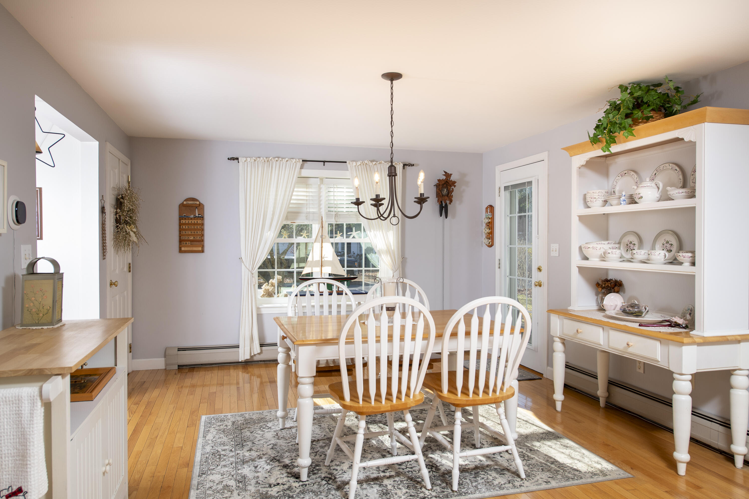 31 Mashpee Neck Road Mashpee, MA 02649 - Photo 6 of 65 a living room with furniture and a wooden floor