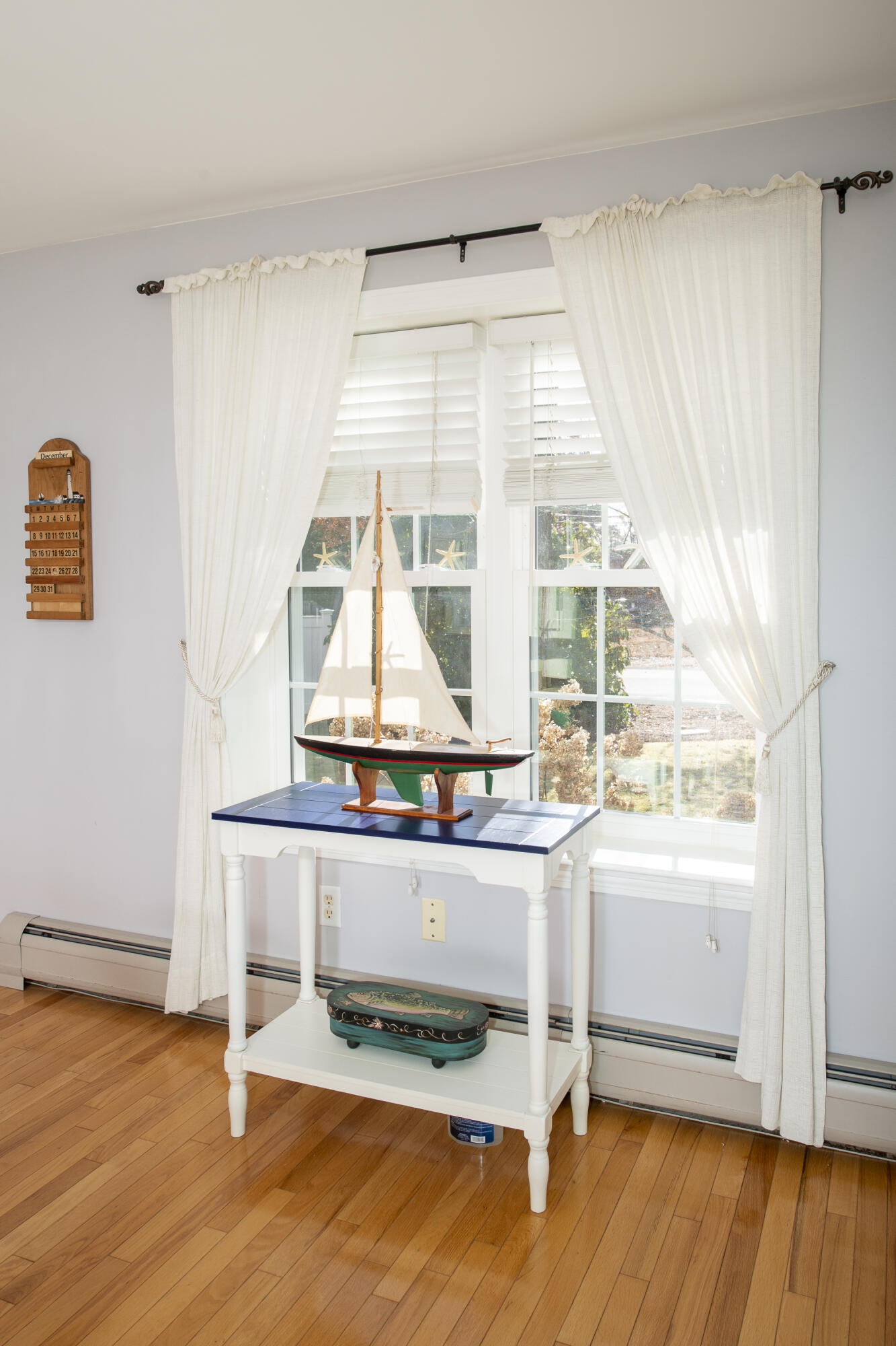 31 Mashpee Neck Road Mashpee, MA 02649 - Photo 10 of 65 a room with wooden floor and window
