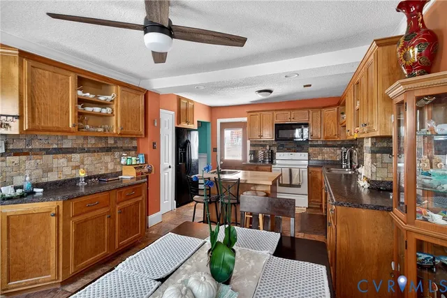 a kitchen with stainless steel appliances lots of counter top space