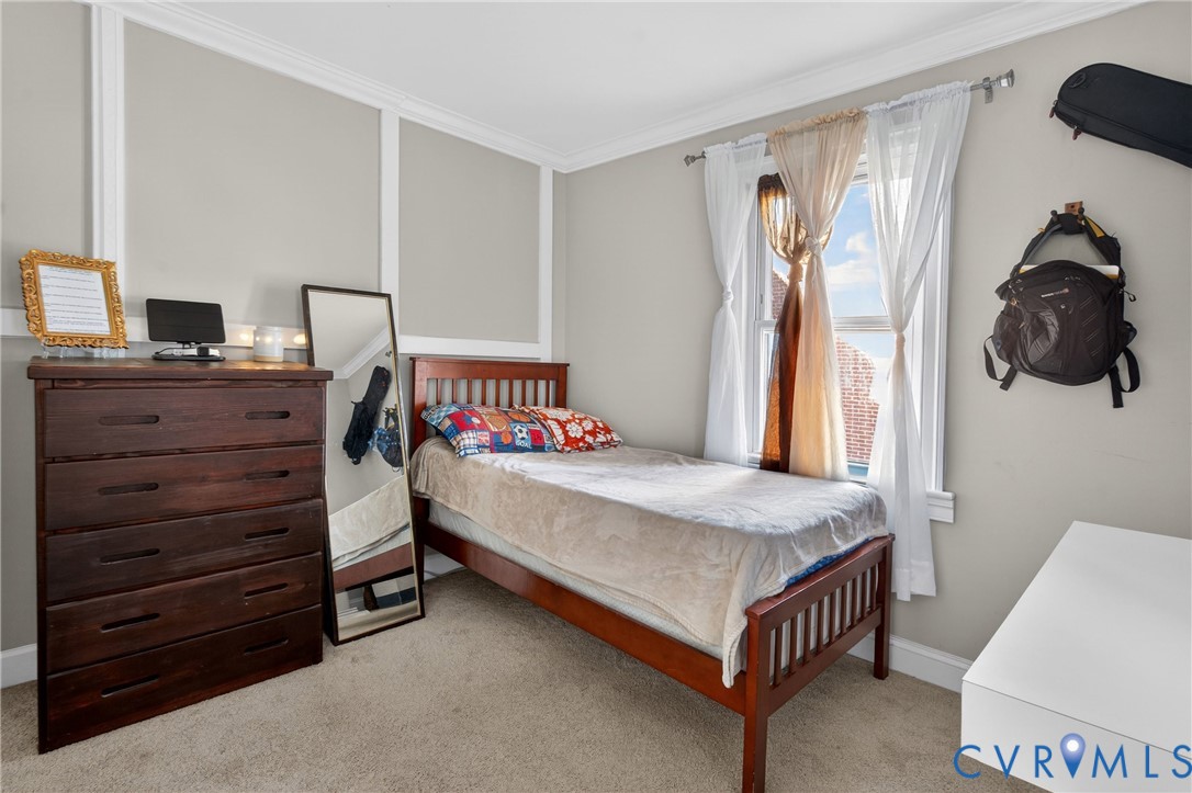 919 Colonial Avenue Colonial Heights, VA 23834 - Photo 15 of 31 a bedroom with a bed and a window