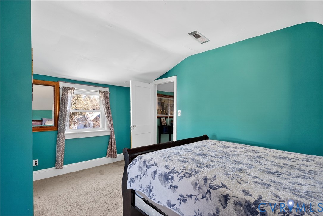919 Colonial Avenue Colonial Heights, VA 23834 - Photo 22 of 31 a bedroom with a bed and a window