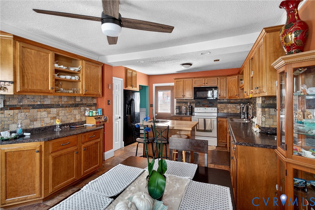 919 Colonial Avenue Colonial Heights, VA 23834 - Photo 9 of 31 a kitchen with stainless steel appliances lots of counter top space