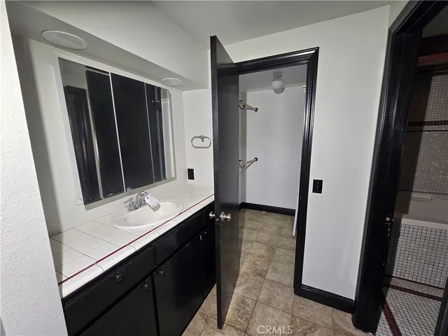 a bathroom with a bathtub and a toilet