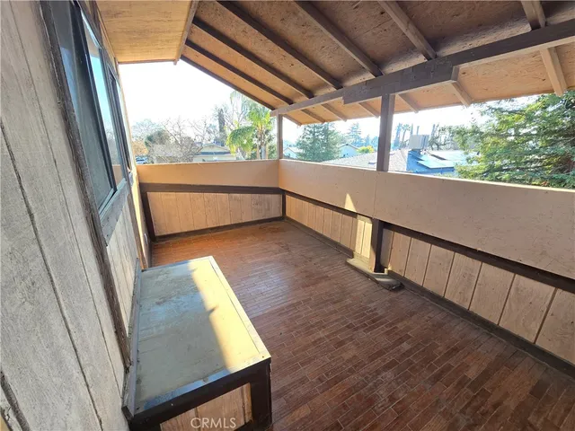 a view of an empty room with a balcony