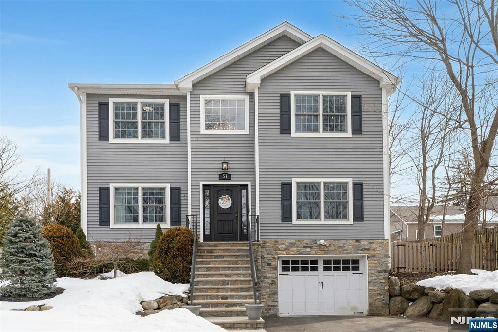 51 Terrace Street Park Ridge, NJ 07656 - Photo 1 of 29 a front view of a house with a yard
