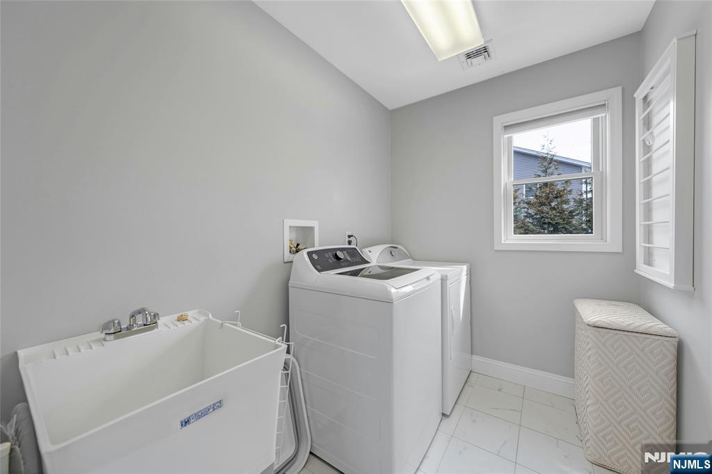 51 Terrace Street Park Ridge, NJ 07656 - Photo 17 of 29 a utility room with dryer and washer