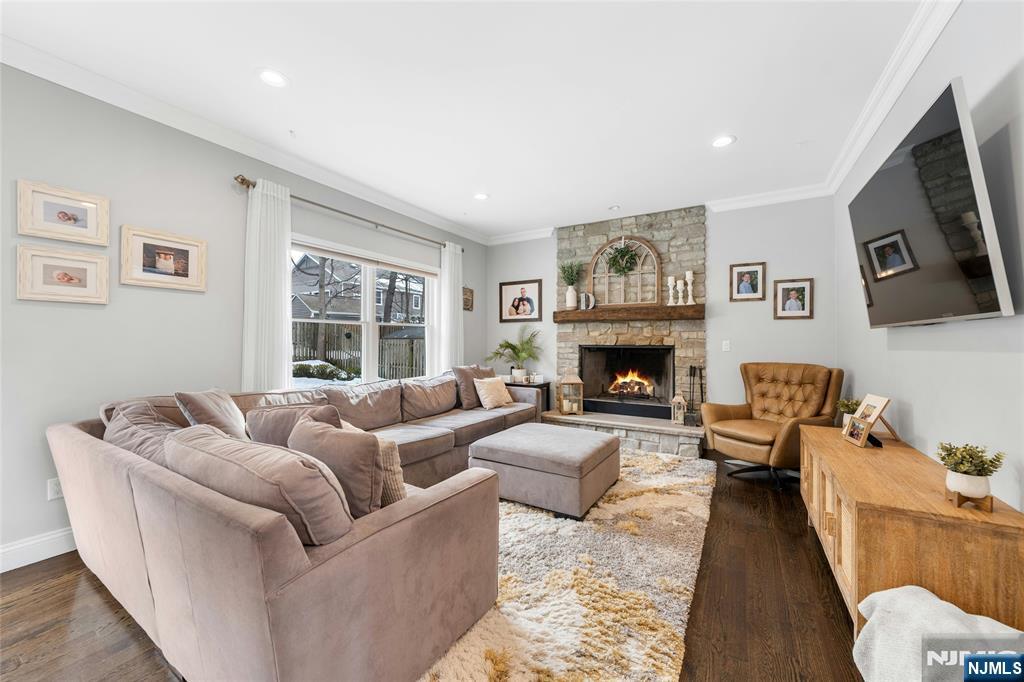 51 Terrace Street Park Ridge, NJ 07656 - Photo 8 of 29 a living room with furniture window and a fireplace