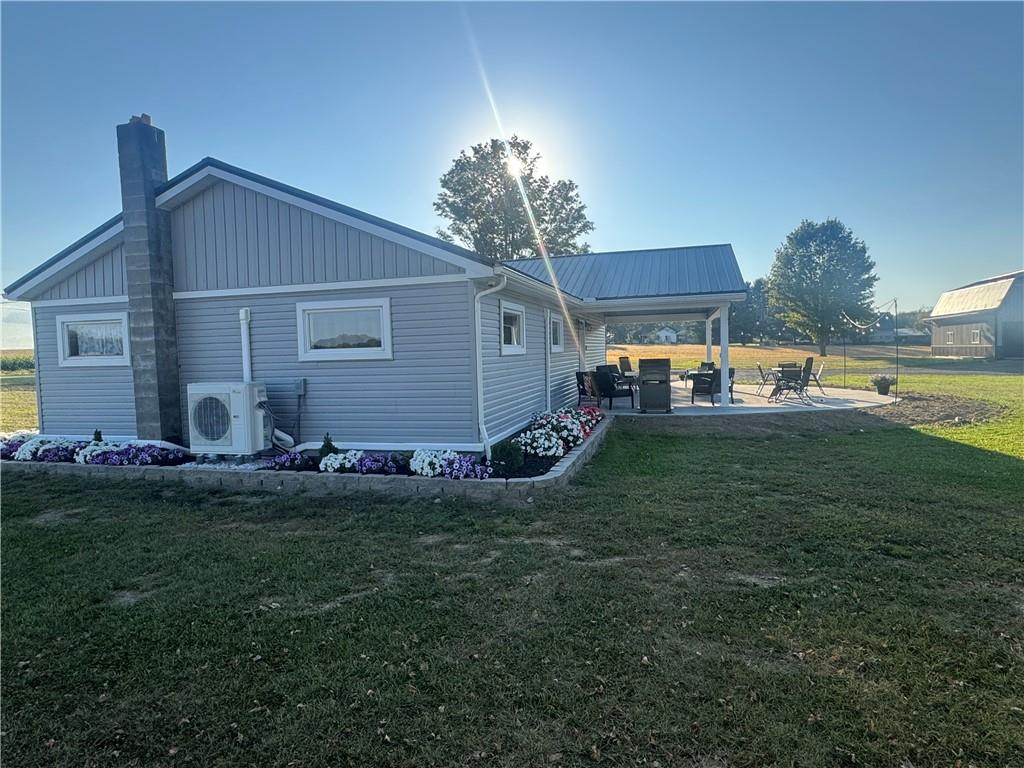 2672 West County Line Road Jamestown, PA 16134 - Photo 5 of 14 a view of a house with a backyard