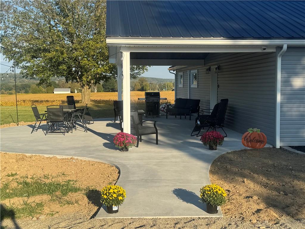 2672 West County Line Road Jamestown, PA 16134 - Photo 6 of 14 a view of a swimming pool with chairs in patio