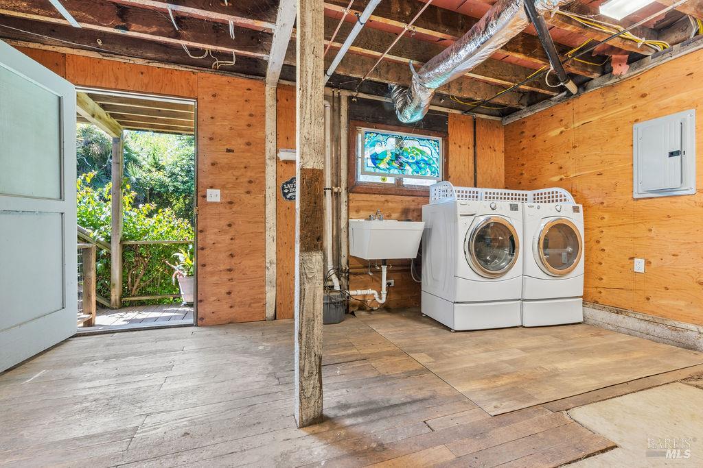 411 Main Street Sausalito, CA 94965 - Photo 22 of 33 Washer/dryer are in basement including a sink