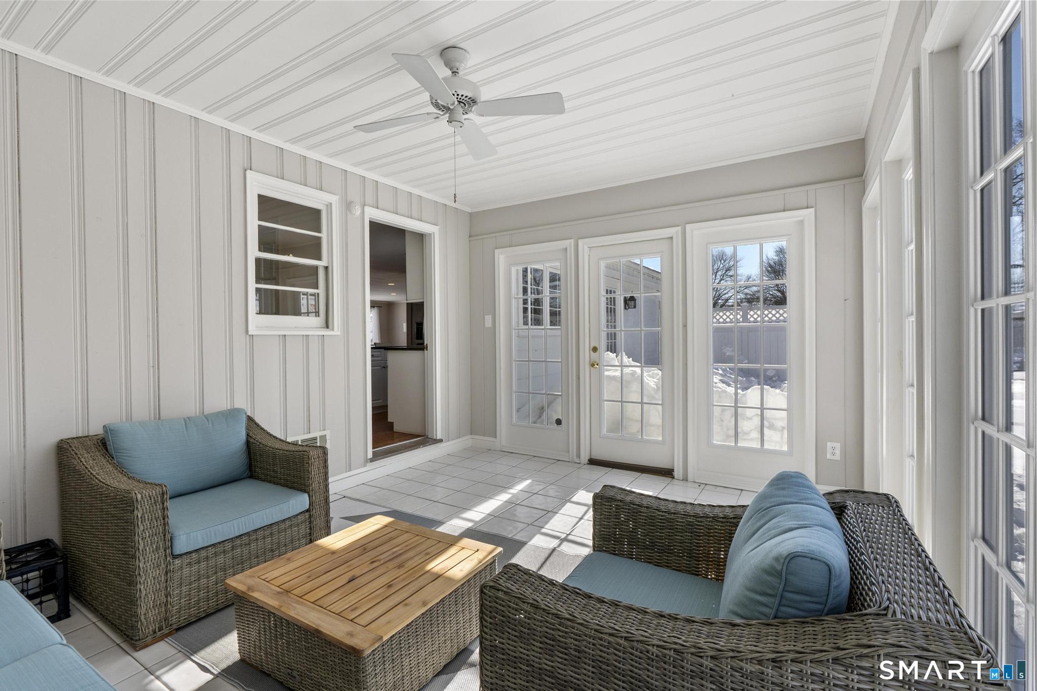 21 Karen Road West Hartford, CT 06117 - Photo 22 of 40 Trex deck off the sun room, very private, with a barn door