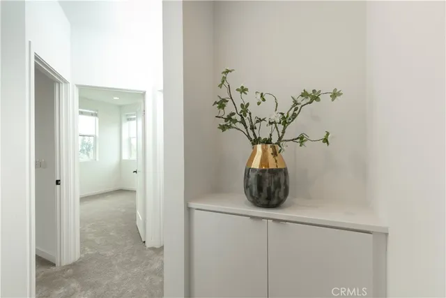 a vase of flowers sitting on a table