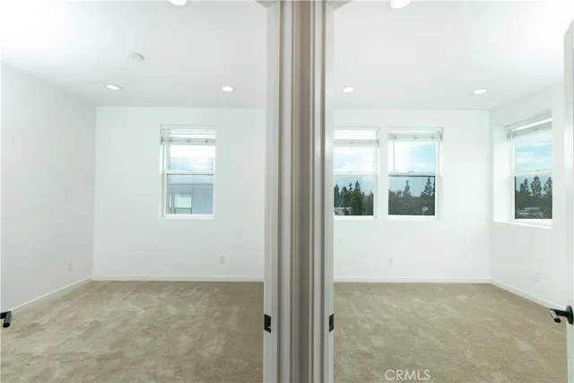 an empty room with windows