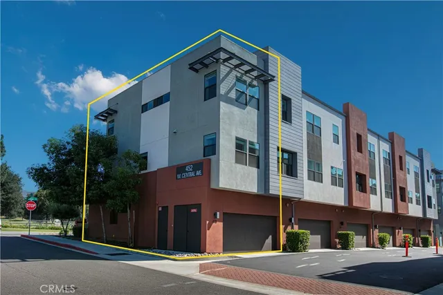 a view of a building with a street