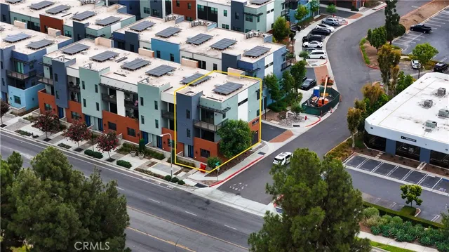 an aerial view of multi story residential apartment building