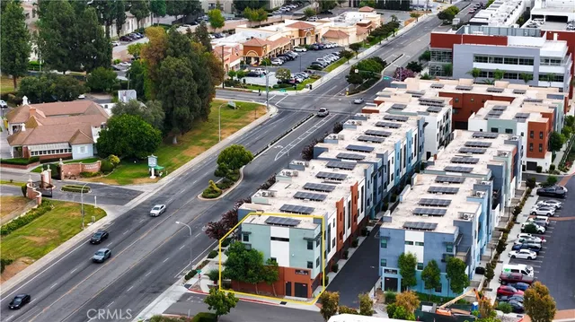 a view of city with tall buildings